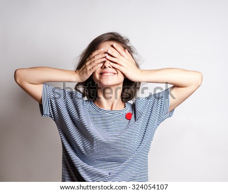 Funny lifestyle portrait of crazy girl closed her eyes,emotional and happy mood,