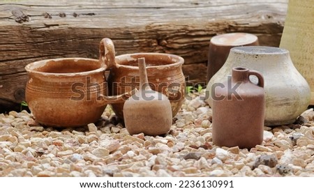 Clay pots arranged in a row as a decoration, an ornament in the garden. Zdjęcia stock © 