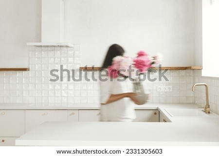 Similar – Image, Stock Photo blurred woman with an umbrella in rainy days in Bilbao city, Spain