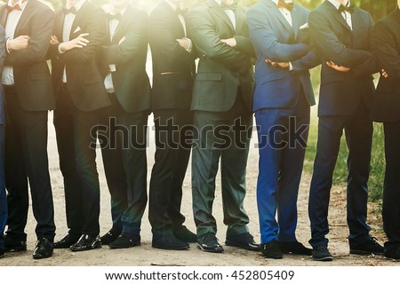 Similar – Image, Stock Photo Groom and best man putting on the suit