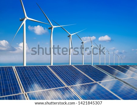 Solar energy panel photovoltaic cell and wind turbine farm power generator in nature landscape for production of renewable green energy is friendly industry. Clean sustainable development concept. Foto d'archivio © 