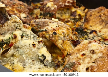 Hot appetizing baked sturgeon close up