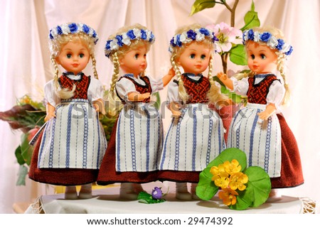 Doll in Prussian folk costume. Craft.