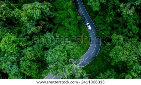 Similar – Image, Stock Photo Winding asphalt road through forest