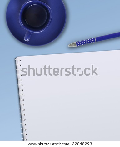 plain paper book with pencil and empty blue coffeecup