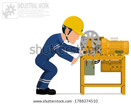 An industrial worker is repairing machine
