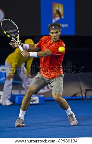 MELBOURNE, AUSTRALIA - JANUARY 26: Rafael Nadal(ESP)[1] is defeated by David Ferrer(ESP)[7] at the Australian Open on January 26, 2011 in Melbourne, Australia