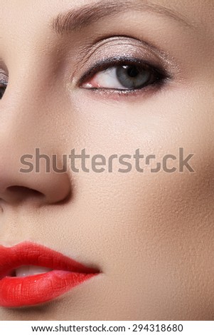 Closeup portrait of a woman with bright classic make-up.