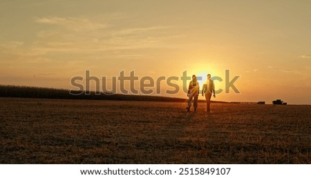 Similar – Image, Stock Photo Silhouettes pair walking through tunnel towards the sun