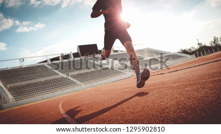 Sport Backgrounds, Male runner ready for sports exercise, Athlete running on athletic track. Foto d'archivio © 