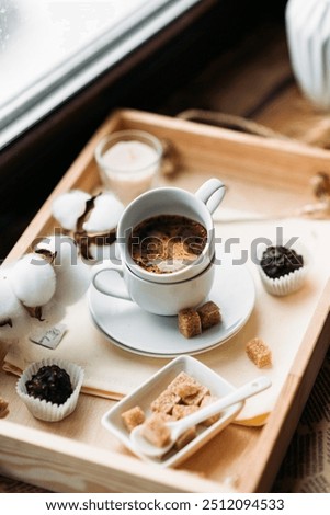 Similar – Foto Bild Frische Blumen im Becher auf Holztisch