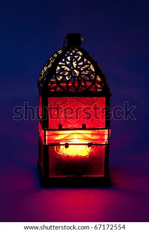 Burning lantern in the dark
