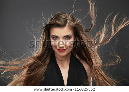 Woman long hair portrait isolated on gray background