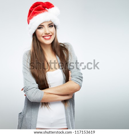Christmas Santa hat isolated woman portrait . Smiling happy girl on white background.