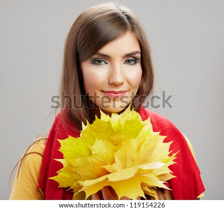 Yellow autumn leaves, close up woman face portrait