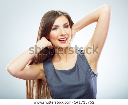 Portrait of young smiling business woman white background isolated. Female model corporate business dressed.