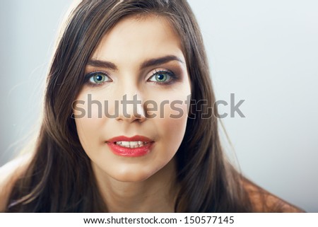 Girl face close up. Beauty young woman isolated portrait. Model pose in studio in beauty style.