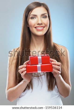 Woman hold gift box, beauty portrait. Young model.