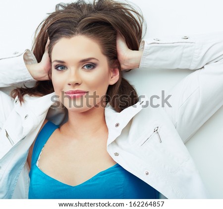 Beautiful smiling woman with long brown hair, isolated white background portrait.