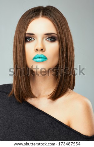 Woman blue lips beauty portrait. Female model with long straight hair.