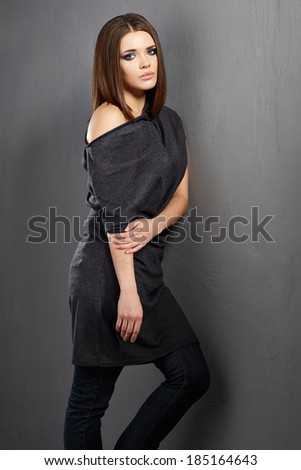 Young woman fashion style portrait. Posing beautiful model.