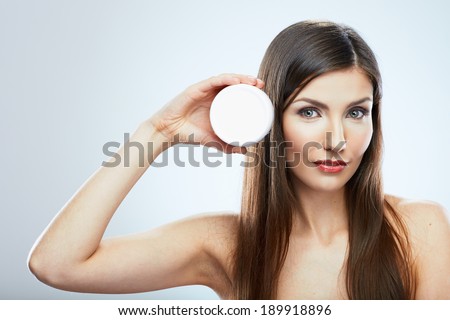 Beauty girl with face, body cream. Studio isolated portrait.