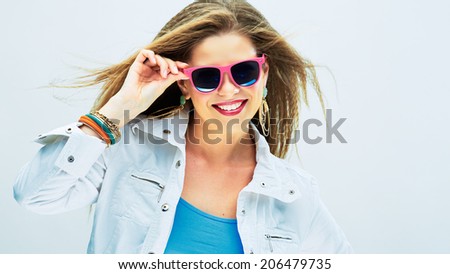 Smiling fashion model in funky style. Long hair/ Young woman.