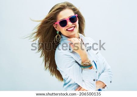 Smiling fashion model in funky style. Long hair/ Young woman.