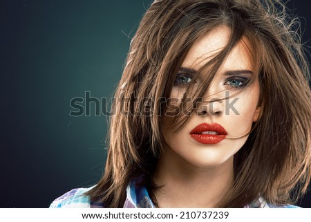 Woman face close up beauty portrait. Female model with long hair.