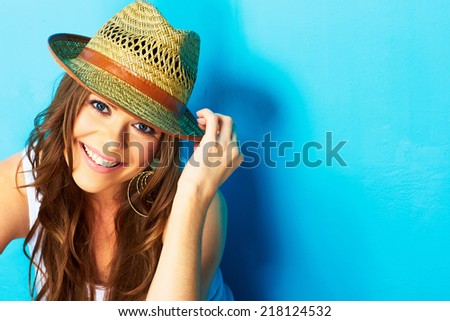 beautiful modern woman portrait with big natural toothy smile . face close up . straw hat