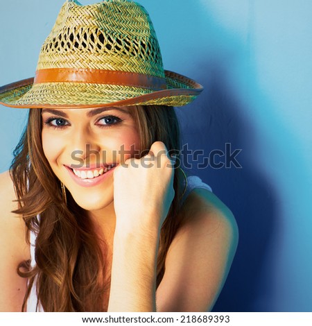 beautiful modern woman portrait with big natural toothy smile . face close up . straw hat