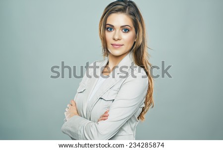 Confident Business woman isolated portrait. Crossed arms. Studio isolated