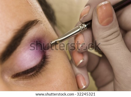 Process of drawing of a make-up on eyes