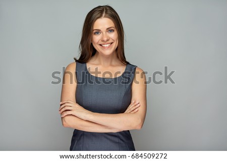 Photo of Isolated portrait of smiling  business woman with crossed arms.