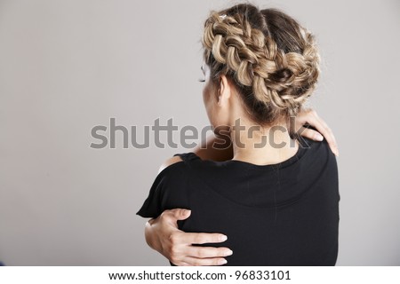 Woman hair style portrait back turned .