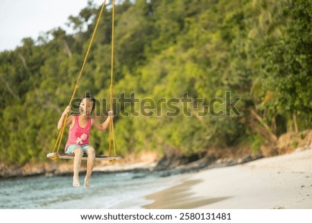 Similar – Image, Stock Photo Coastal landscape and girl in yellow hooded coat looking at sea and walking. Copy space.