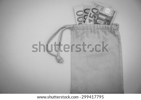 black and white euro money in pouch