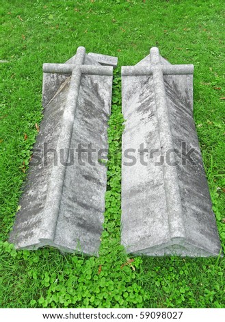 Two side by side nineteenth century grave coverings