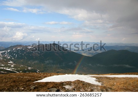 Panorama of the Carpathians with a rainbow