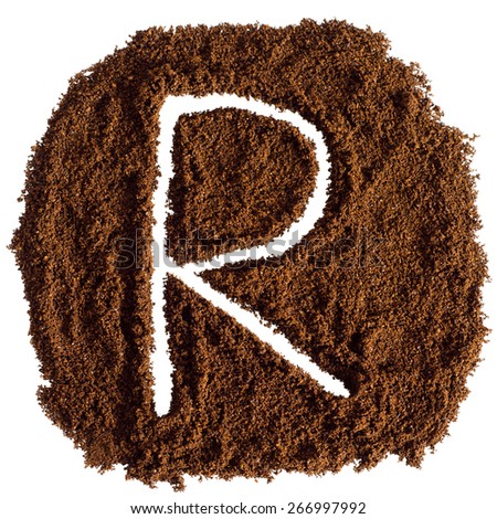 The letter R written on-ground coffee