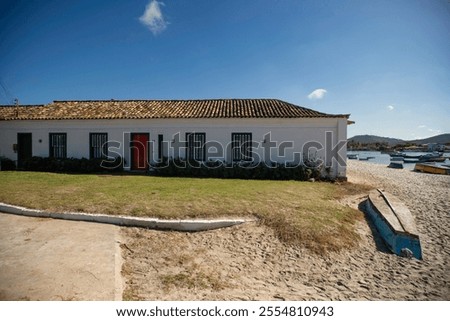 Similar – Image, Stock Photo House facade with four windows and a sign ” Fruit and vegetables ” / Crosseffekt / Lost Place / Property /