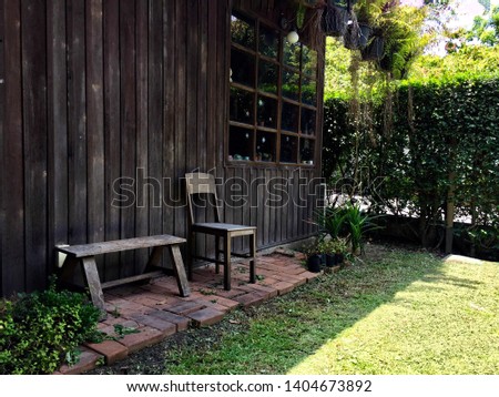 Front Of Old House With Wooden Door And Green Trees Images