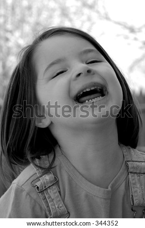 Little girl with a big laugh and a dirty mouth