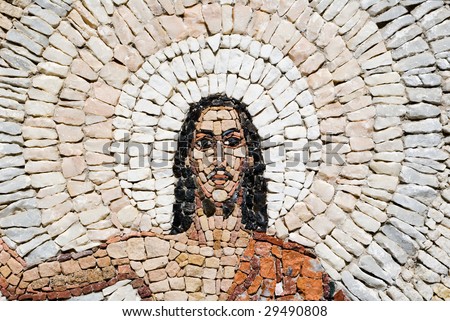 a fragment of a stone mosaic  of Jesus Christ resurrection