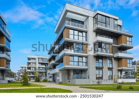 Similar – Image, Stock Photo Modern apartment house in pastel colours with balconies in the light of the evening sun in summer in the Hanauer Landstraße in the Ostend of Frankfurt am Main in Hesse