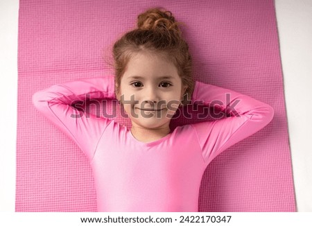 Similar – Image, Stock Photo Flexible acrobatic girl sitting on bed