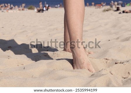 Similar – Foto Bild weibliche Füße auf einem Sandstrand der Meeresbrandung