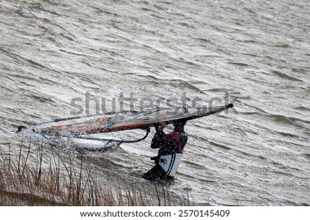 Similar – Image, Stock Photo Crop surfer on board in sea water