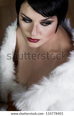20s style beautiful brunette female wearing fur, exquisite old hollywood style, star