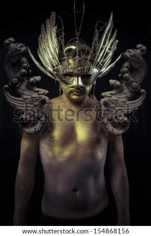 Armor, warrior or ancient god with golden mask and sword greatsword